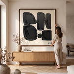 Cargar imagen en el visor de la Galería, Cuadro Kalon decorativo de pared de arte abstracto 1.20x1.20cm en una sala luminosa sobre un mueble.