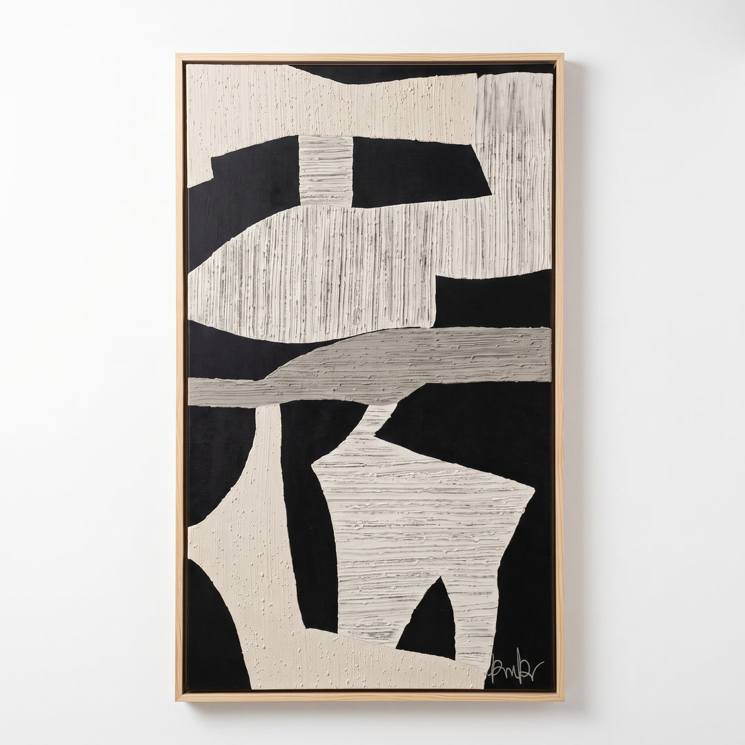 Cuadro Nómadas de arte abstracto en alto relieve con marco de madera de pino sobre pared blanca.