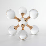 Cargar imagen en el visor de la Galería, Accesorio Decorativo Veta de Cristal y Metal con esferas transparentes y uniones doradas sobre fondo blanco.